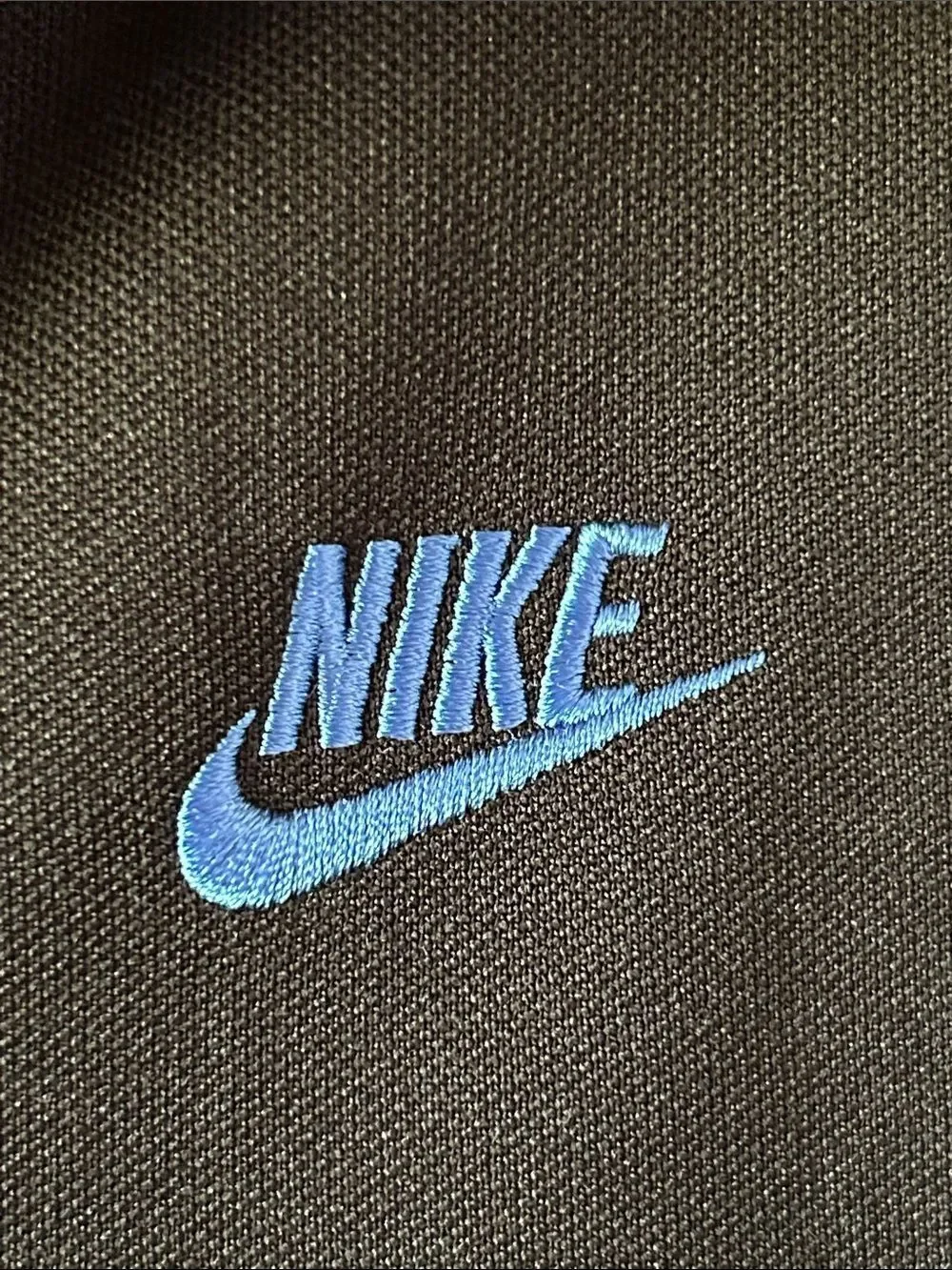 Nike Full Zip Black Jacket with Blue Swoosh Logo